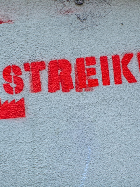 Streik Schriftzug auf Wand